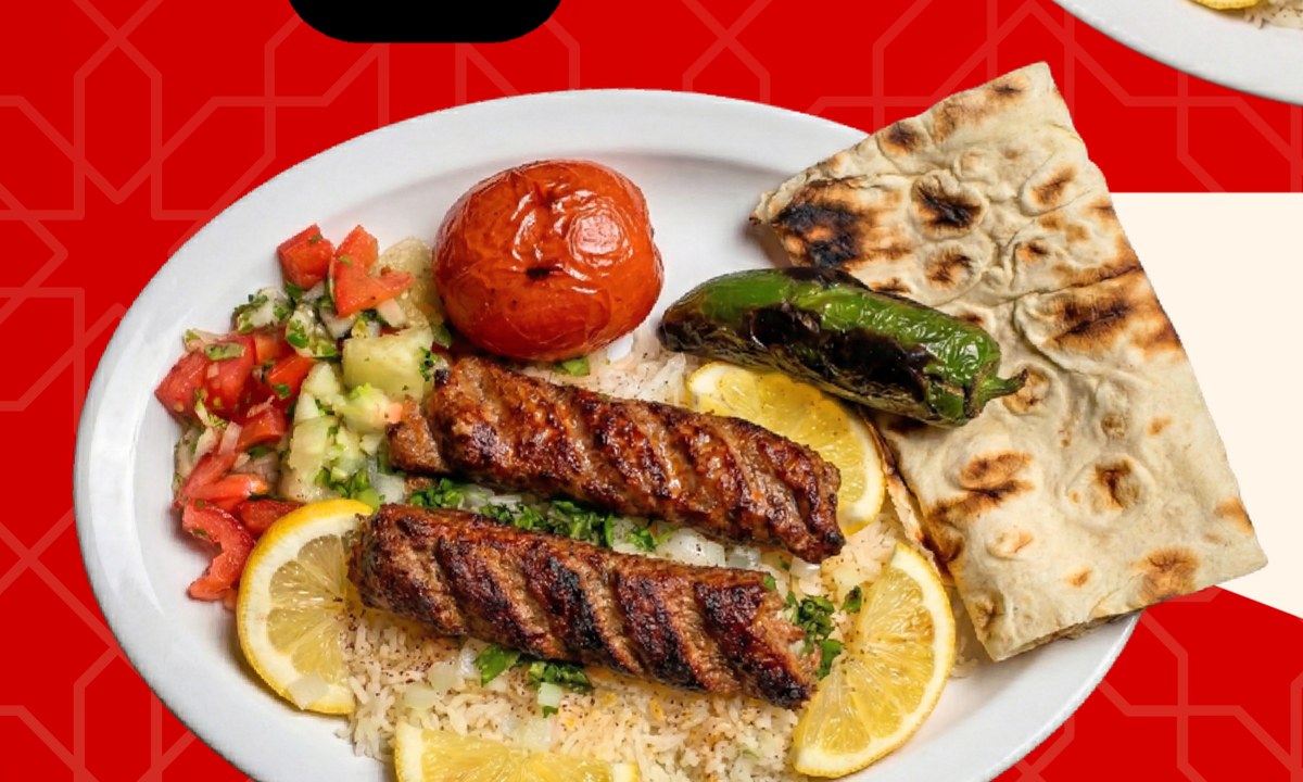Beef Lula Kabob plate with rice, salad, lavash, grilled tomato and pepper