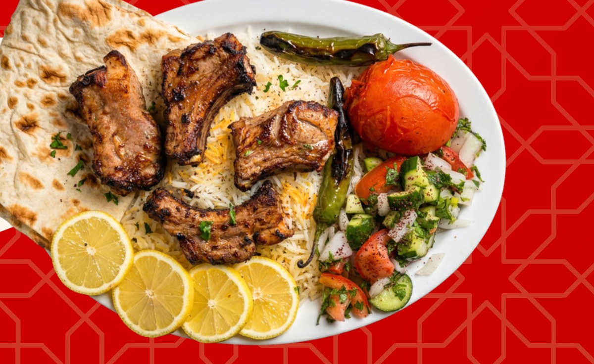 Pork Baby Ribs plate with rice, salad, lavash, grilled tomato and pepper